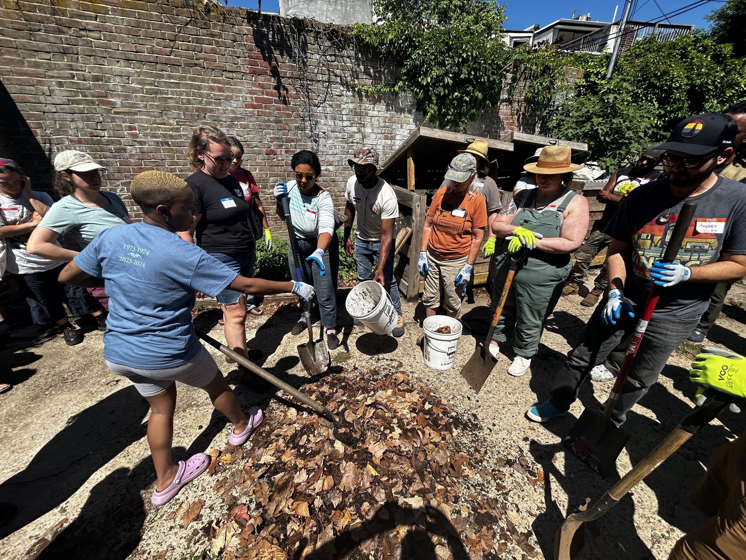 Community learning about composting process.
